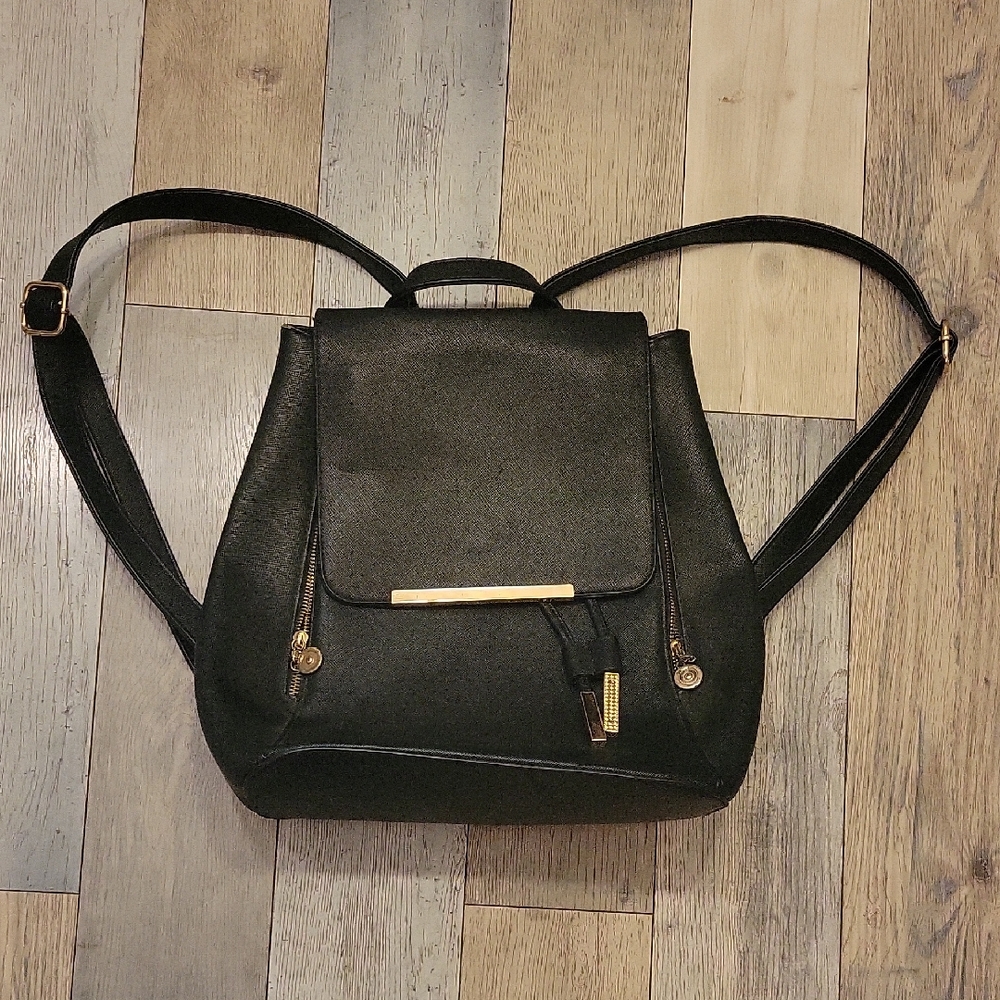 Elegant Black Backpack with Gold Details